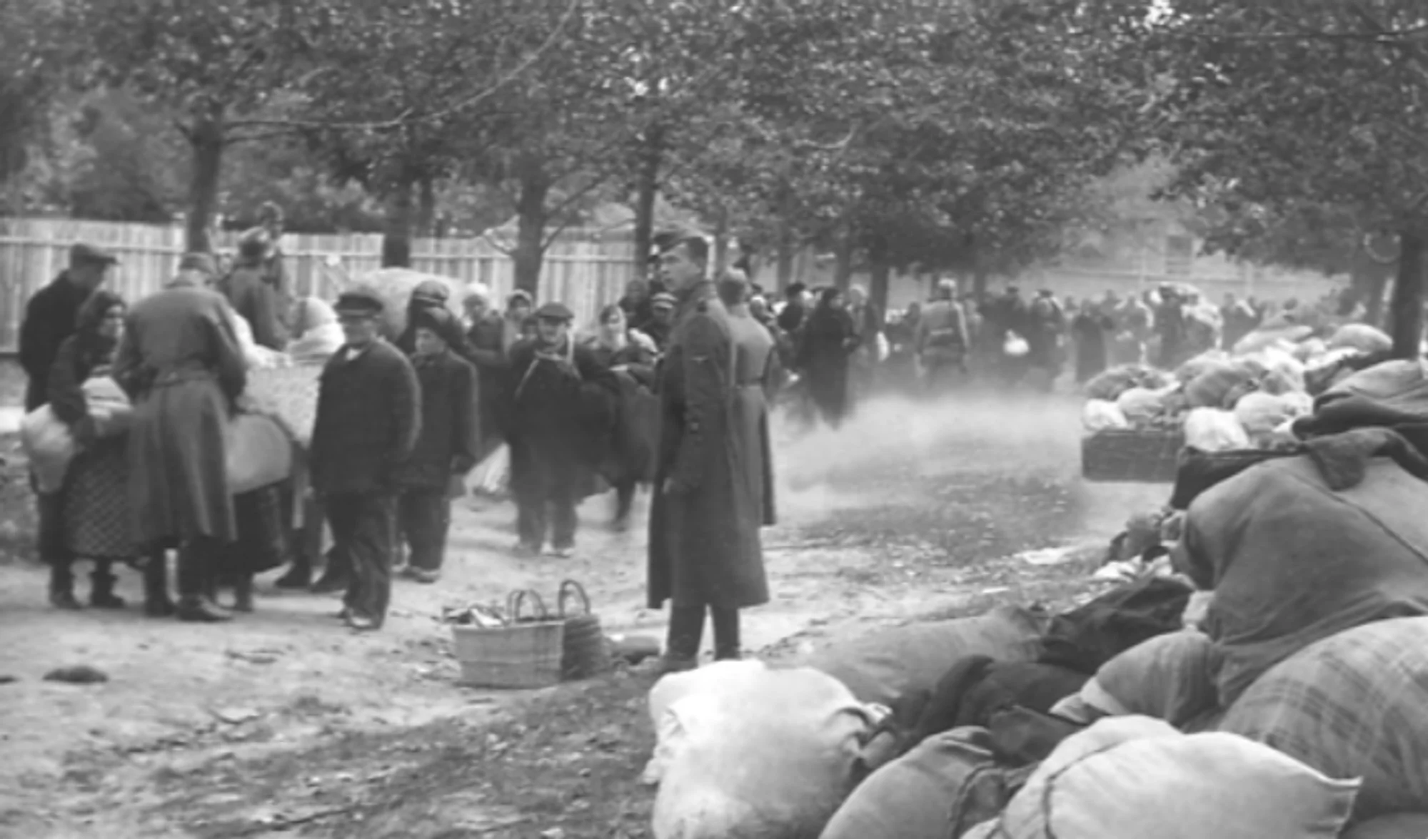 Baggage and outerwear being taken away at the intersection of Dorohozhytska and Jones streets in September 1941. (Photo courtesy of an anonymous sender.)